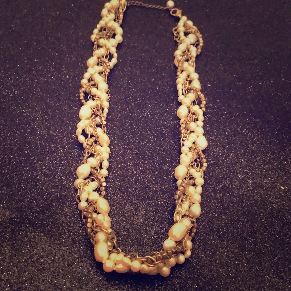 Freshwater pearls with gold tone stone
